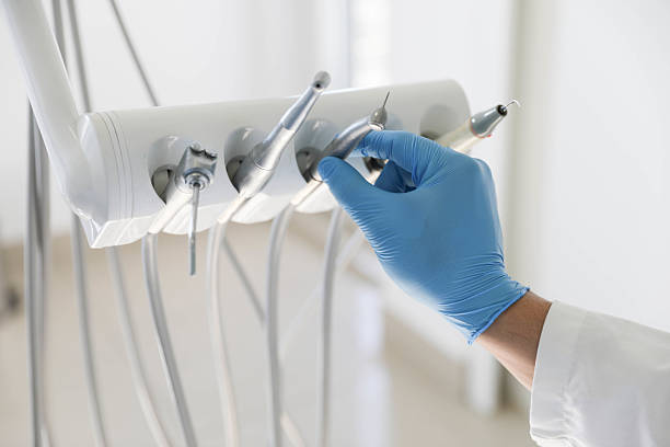 Professional Tooth Extraction technician working in Lake County County, IL
